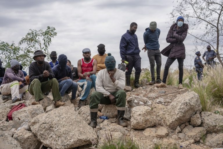 Rescuers wait as zama zamas are pulled from the Stilfontein gold mine shaft